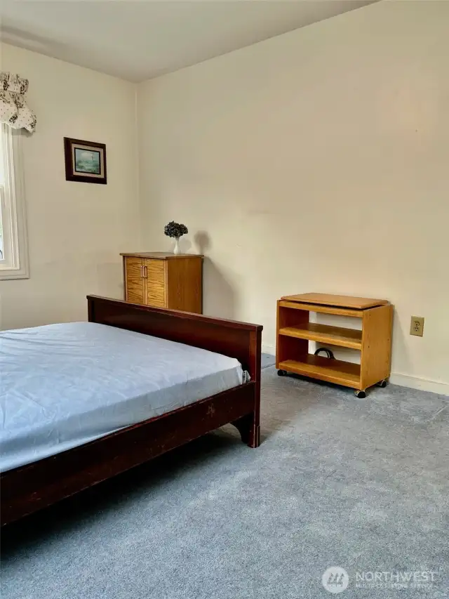 This view of bedroom 1 shows the many uses for the space