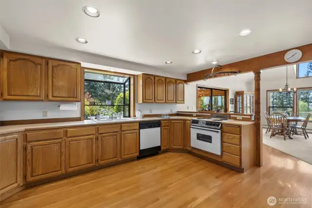This kitchen is open and has so many cabinets!