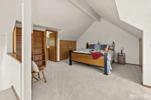 Primary suite on upper floor is large and open!