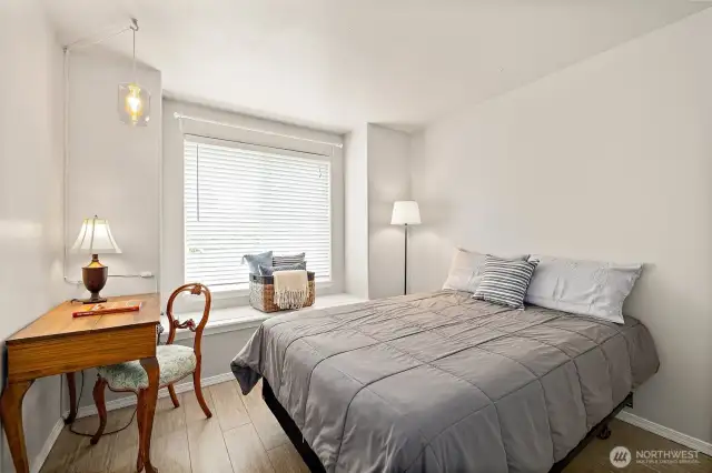 Bedroom #3 with window seat/storage.