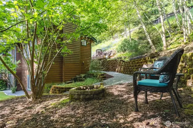 Side yard - another seating area with firepit option!.