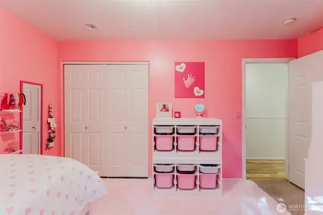Pink bedroom on main level.