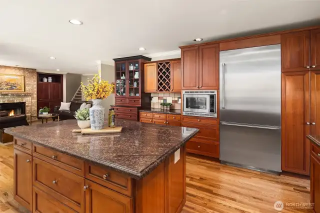 Memories can be made in this kitchen. Room for homework, gathering, baking, all while connected to the family room.