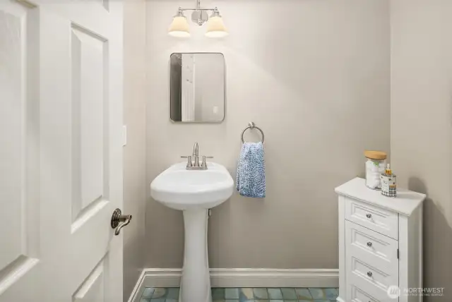 Half bath on the lower level is large enough to add a shower,.