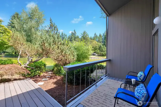 Enjoy lake view from the home with pathway to the waterfront. Platform from deck for easy entertaining