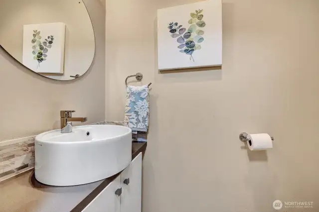 Contemporary style half bath near entry.