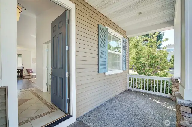 Covered front porch is a great place to relax and watch the world go by.