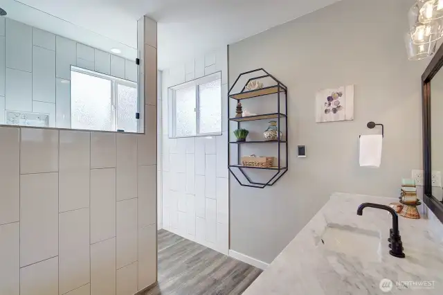 Fully tiled walk in shower.