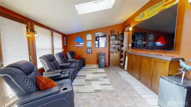 Bonus flex room off main deck/outdoor kitchen area, perfect for a home theater, home office, hobby room, etc.