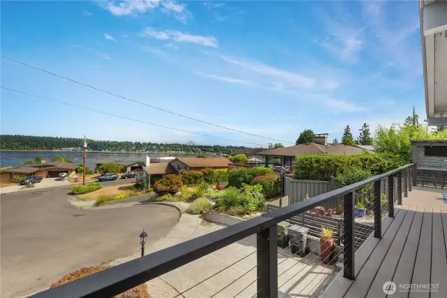 Wrap around front deck with views of the Puget Sound and Mt Rainier
