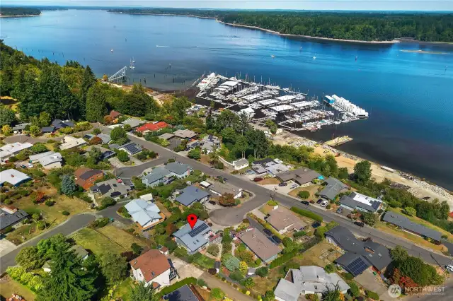 Red arrow shows proximity of home to West Bay marina.