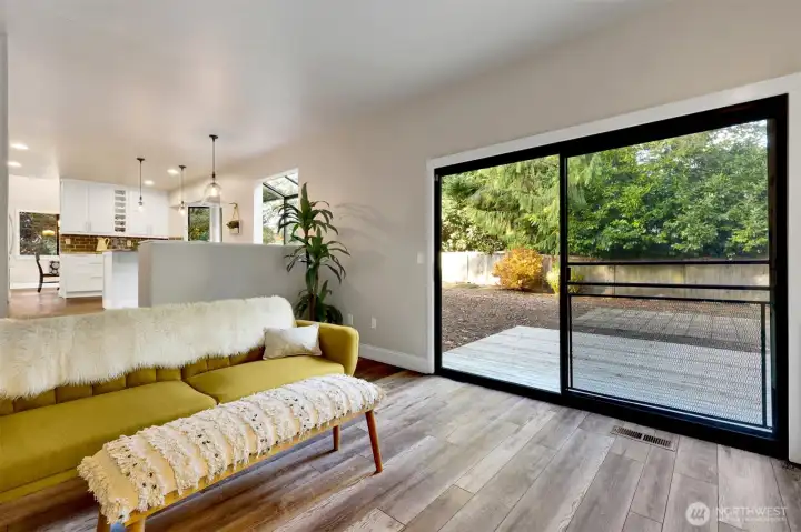 Family room has a slider going to the deck and the backyard.