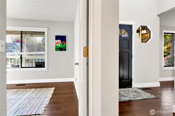 You can see the front door to your right and the entrance to the office (can be used as a bedroom too!) to your left.