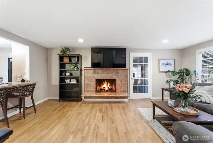 cozy wood burning fireplace hardwood floors