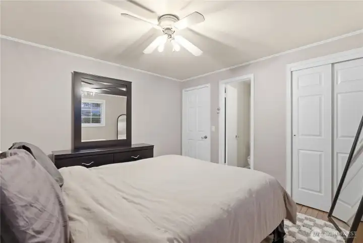 primary bedroom with half bath