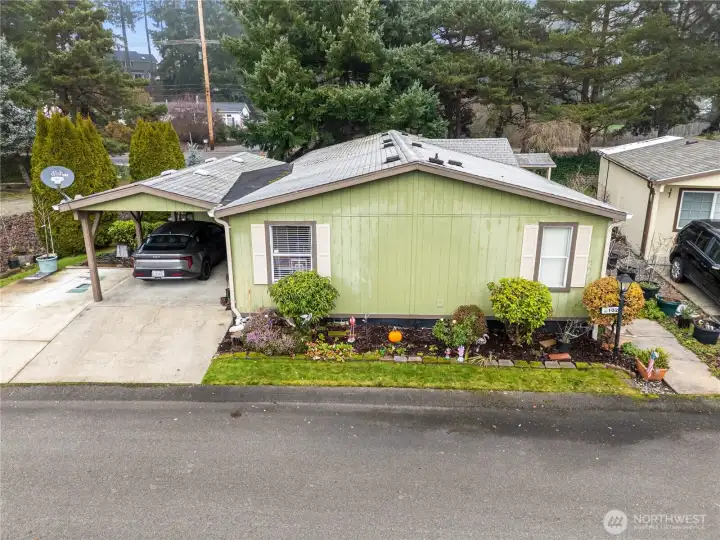 Fully landscaped with sprinklers.