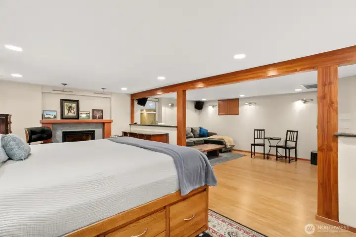 Lower level ADU w/ bedroom, gas fireplace, living room, 3/4 bath, kitchen, laundry and access to 1 car garage.