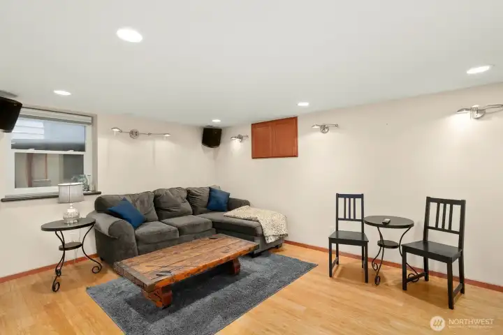 Lower level ADU w/ bedroom, gas fireplace, living room, 3/4 bath, kitchen, laundry and access to 1 car garage.