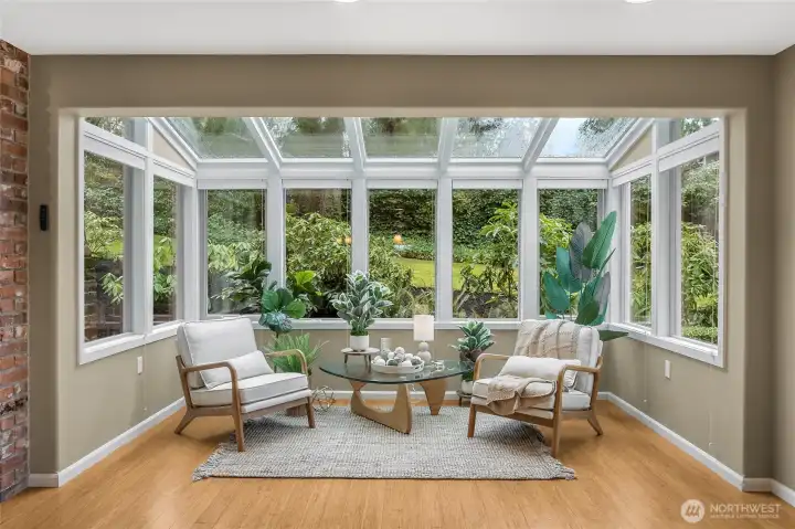 No more gloomy days! Come get all your vitamin d from this glorious atrium just off the kitchen.