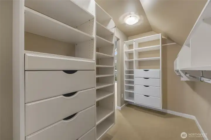 Primary bedroom closet with lovely built-ins
