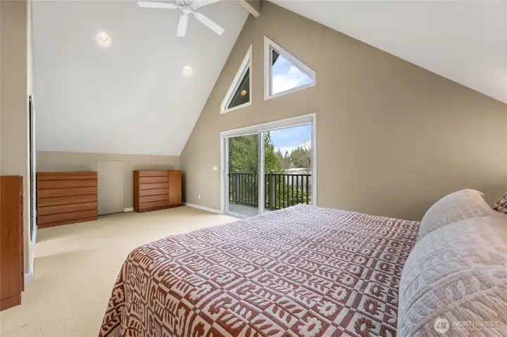 The primary bedroom is very spacious, with its own balcony and 3/4 bath. There is plenty of room to expand the bathroom into an indulgent spa inspired space.