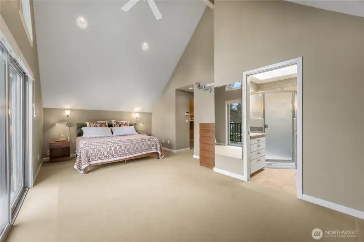 Another shot of the primary bedroom and bathroom.