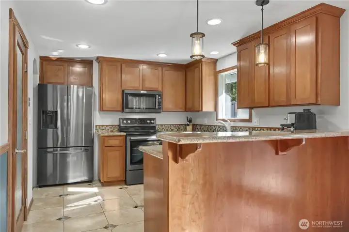 Love the matching stainless steel appliances, and updated fixtures.