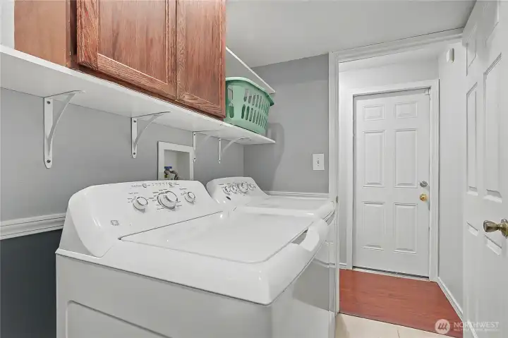 Utility Room with nice storage, garage straight ahead.