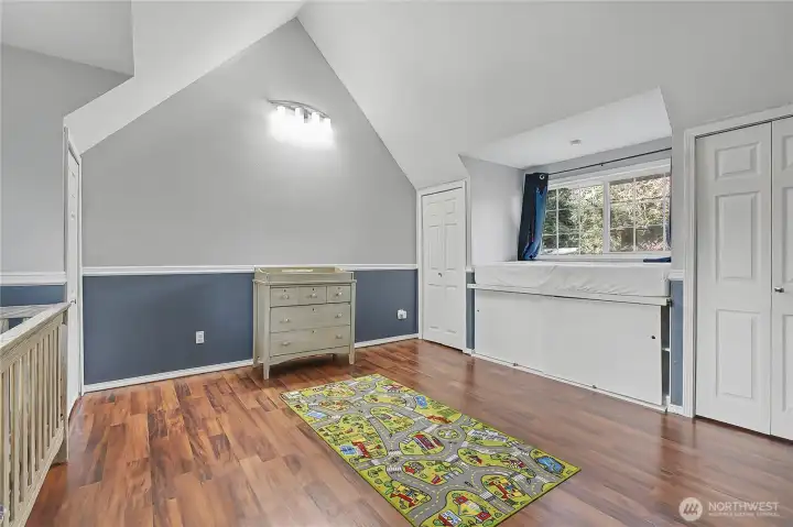 Bedroom #2 upstairs, LOVE the cathedral ceiling and window seat with storage! Double closets as well, spacious.