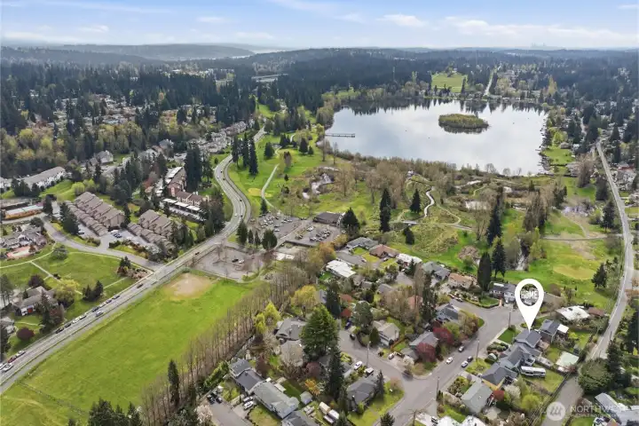 Adorable neighborhood of sidewalks and well kept homes close to Lake Ballinger.