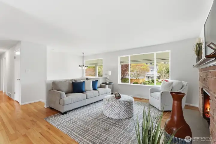 Bright open living spaces. Don't miss the gleaming hardwoods, vinyl windows, fresh paint, white trim and doors, and more.