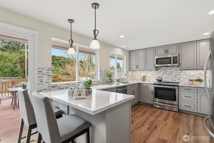 Gorgeous remodeled kitchen will impress.