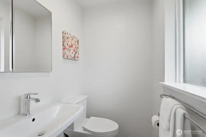 Primary bedroom en suite bathroom.