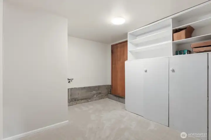 Mud room off the garage with lots of storage space.