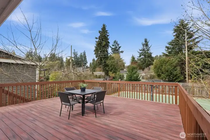Entertainment size deck with lovely views looking out over the backyard.