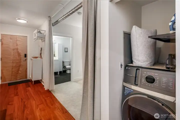 Washer/dryer located in the unit