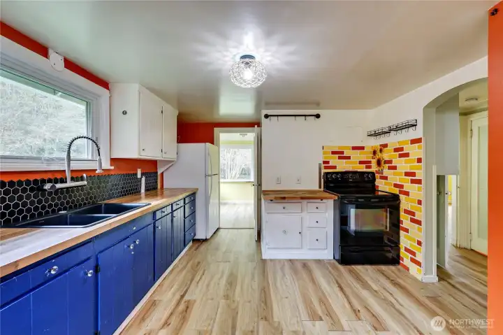 New flooring has replaced this in kitchen.