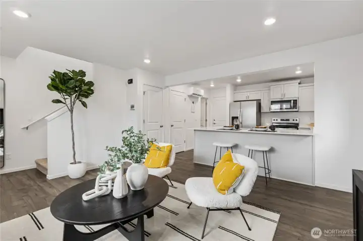 Open concept great room and kitchen. Photos are for representational purposes only, colors, elevation and features may vary.