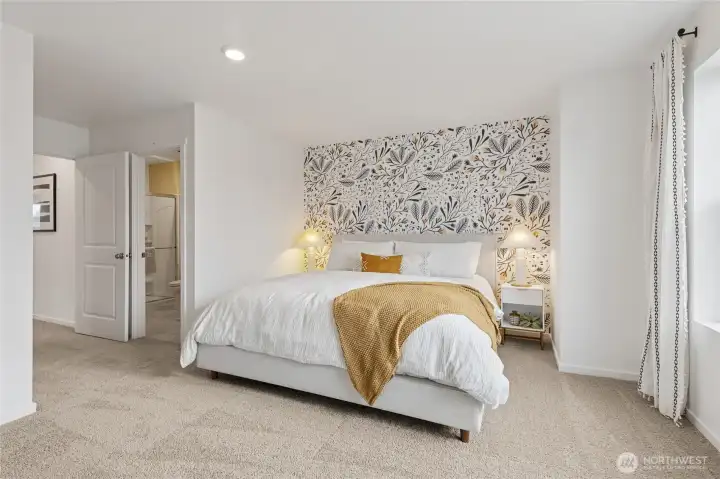 Spacious primary bedroom with large windows allowing for plenty of natural light. Photos are for representational purposes only, colors, elevation and features may vary.