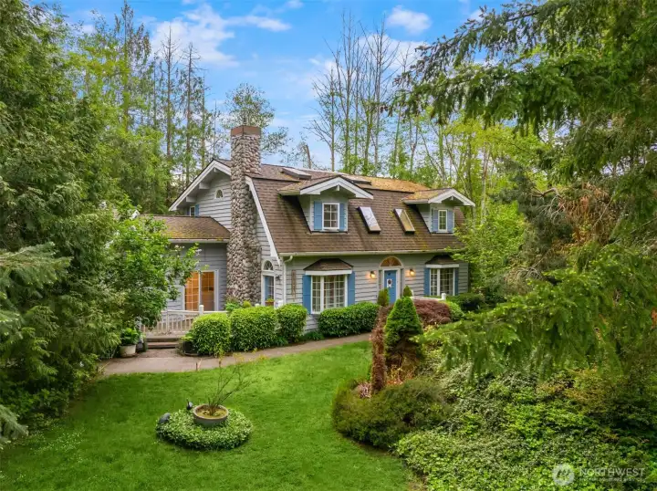 This charming home sits on a shy 1/2 acre on a quiet cul-de-sac.