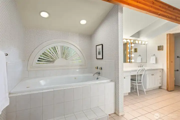 A view of the primary bath with its large soaking tub.