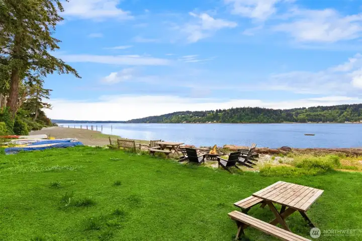 Enjoy the waterfront activity with deeded beach access from a path off of Rhodes End.