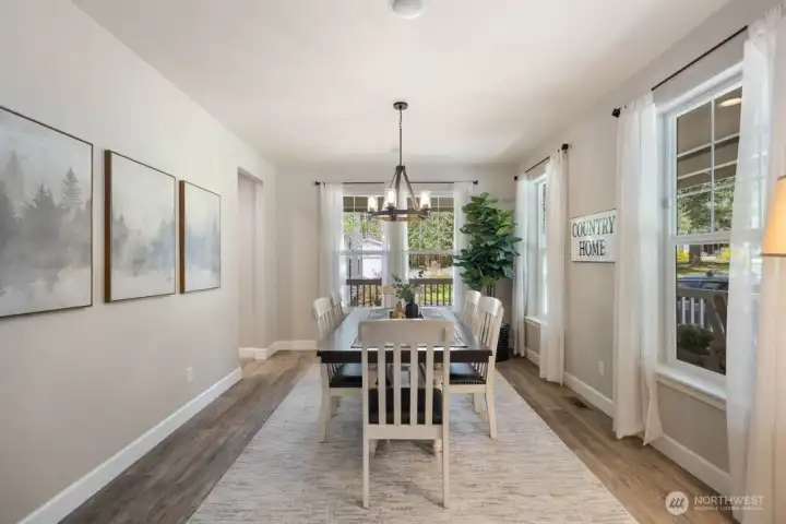 Formal dining w/peaceful front yard views