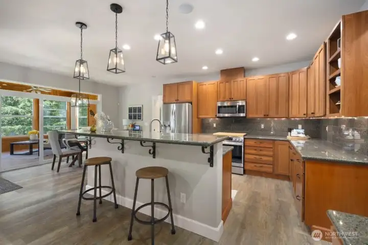 Open connection between kitchen, family room and sunroom