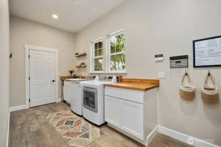 Oversized mudroom w/garage access and room for everyday drop zones
