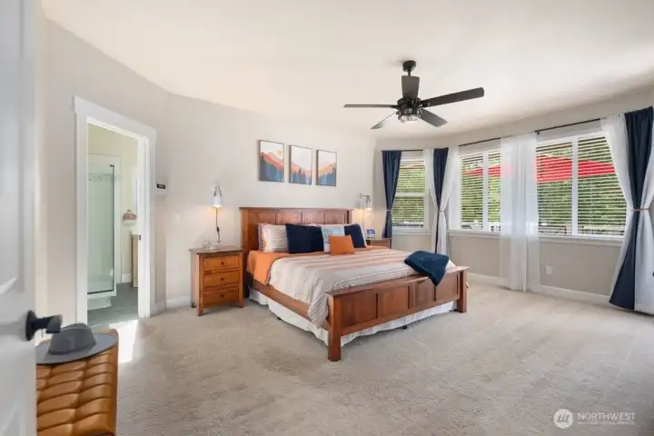 Spacious primary bedroom with ensuite bath