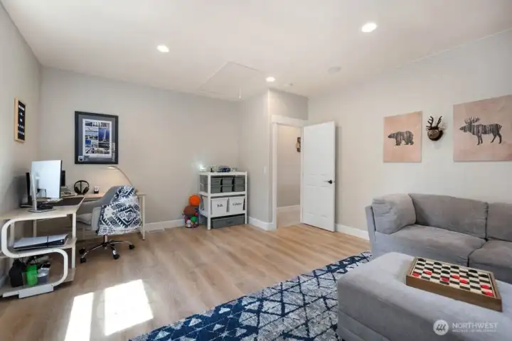 Spacious media/bonus room perfect for movie nights, games or a hangout zone