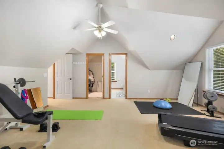 Secondary ensuite w/walk-in closet, private bath and its own private staircase, or the perfect workout room or private retreat