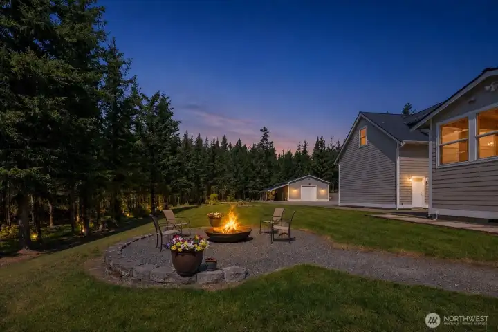 Twilight at the firepit, surrounded by privacy and peaceful grounds