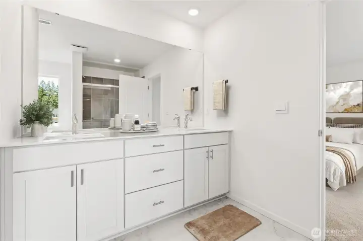 Primary bath features double vanity, quartz countertops, soft close cabinets. Virtual Staged. Primary bath features double vanity, quartz countertops, soft close cabinets. Virtual Staged.